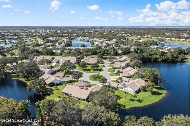 bird's eye view with a water view