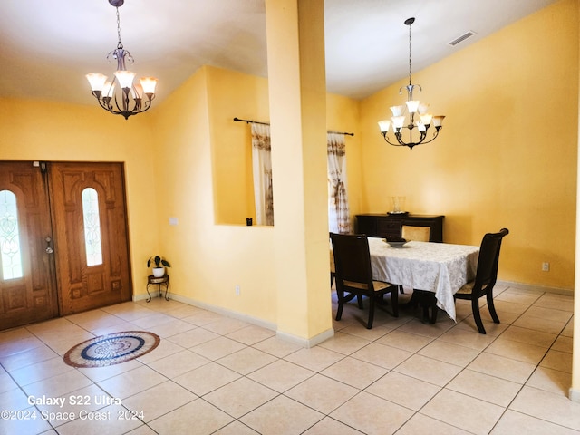 foyer entrance featuring a chandelier and light tile patterned floors