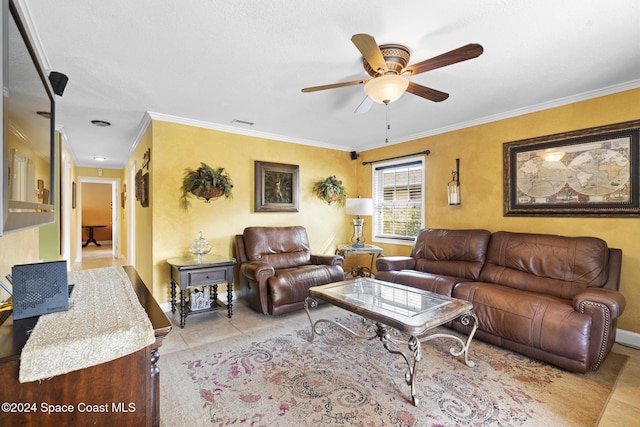 tiled living room featuring crown molding and ceiling fan