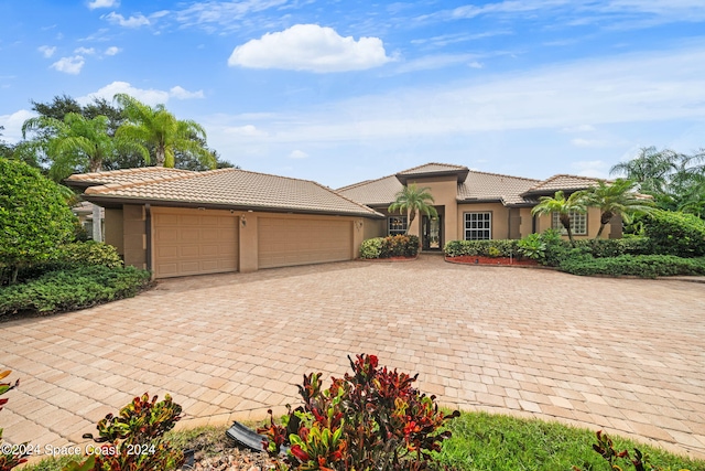 view of front of house with a garage