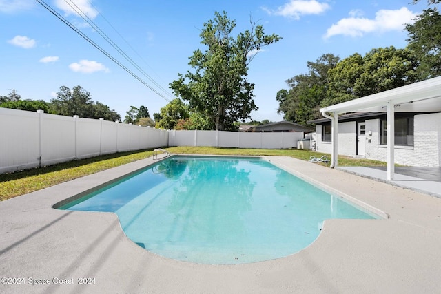 view of pool featuring a patio