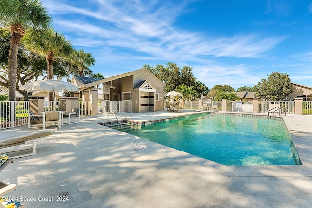 view of swimming pool featuring a patio