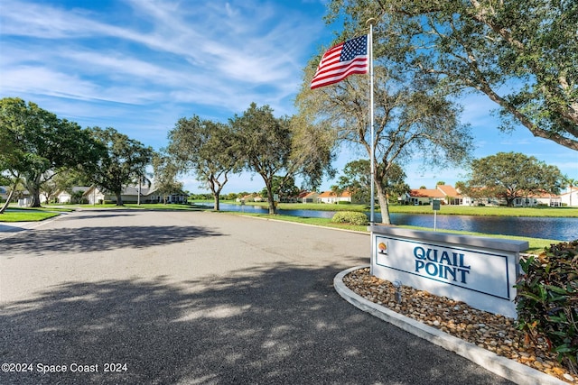 618 Mimosa Ct, Melbourne, FL 32940 - view of street featuring a water view, curbs, and a residential view