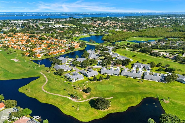 618 Mimosa Ct, Melbourne, FL 32940 - bird's eye view with a water view, a residential view, and golf course view