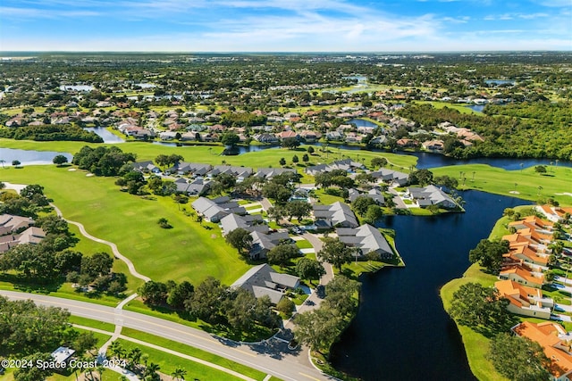 drone / aerial view with a water view