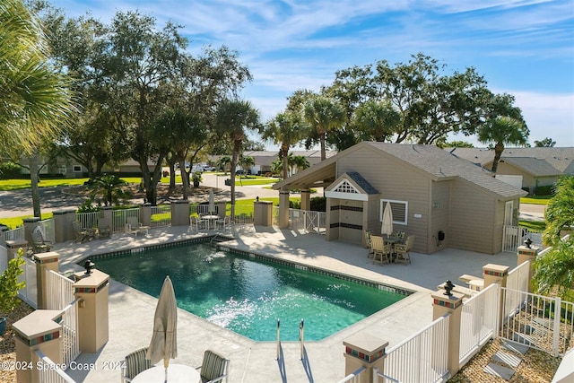 view of swimming pool featuring a patio