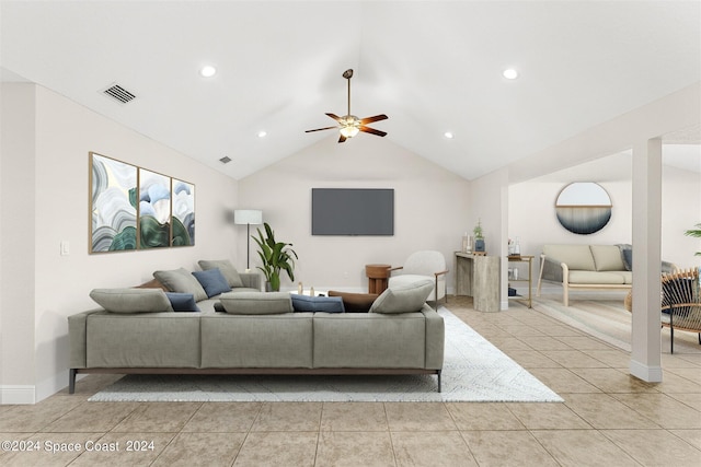 tiled living room featuring vaulted ceiling and ceiling fan