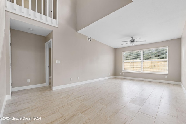 unfurnished room with ceiling fan