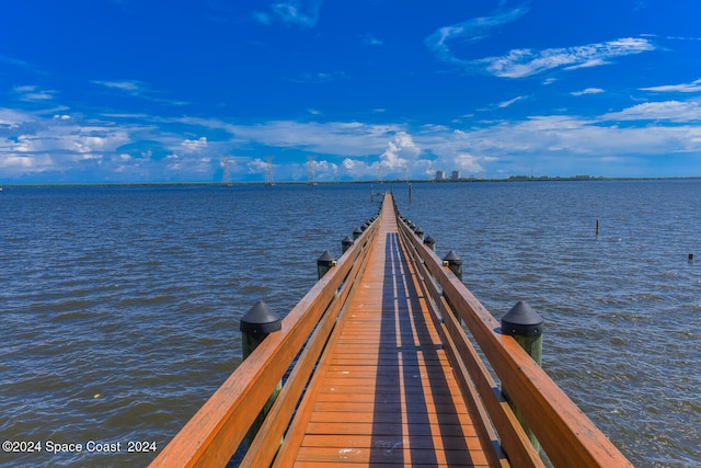 dock area featuring a water view