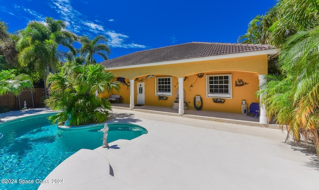 view of pool featuring a patio