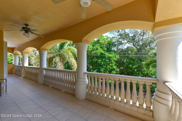 view of patio / terrace featuring a balcony and ceiling fan