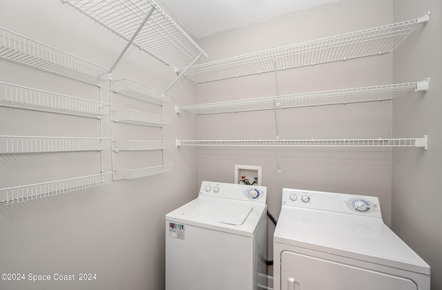 laundry room with washer and dryer