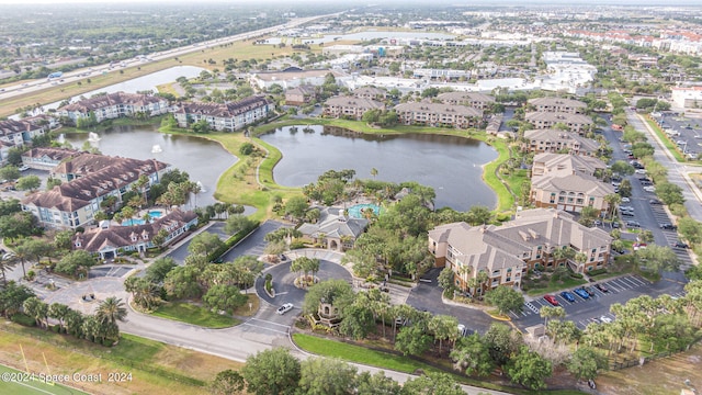 bird's eye view with a water view