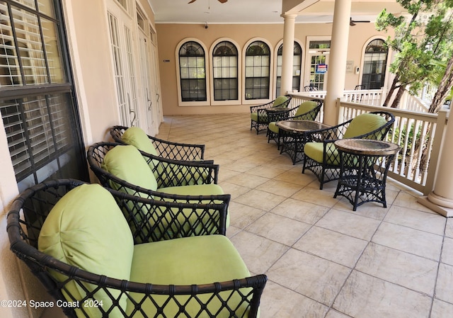 view of patio / terrace featuring ceiling fan