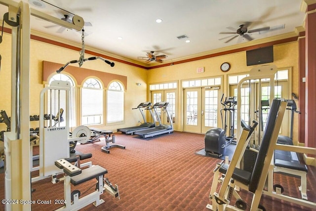 gym with french doors, crown molding, carpet, and a healthy amount of sunlight