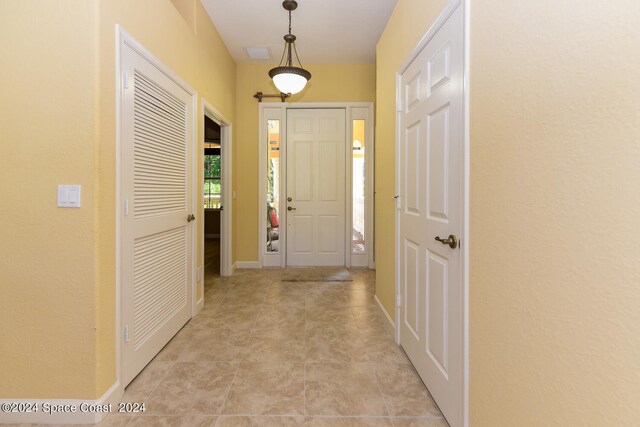 8053 S Indian River Dr, Ft Pierce, FL 34982 - foyer entrance featuring baseboards