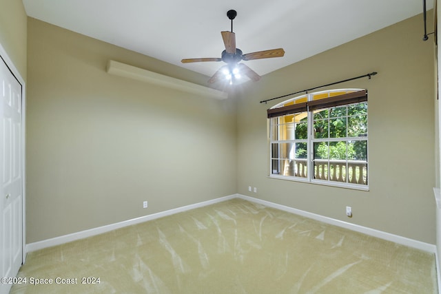 8053 S Indian River Dr, Ft Pierce, FL 34982 - empty room featuring carpet flooring, baseboards, and ceiling fan