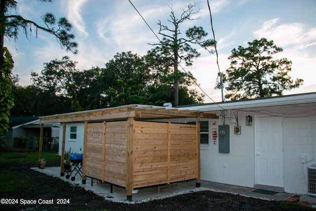 exterior space featuring cooling unit