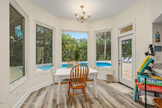 1165 Old Parsonage Dr, Merritt Island, FL 32952 - sunroom with a chandelier