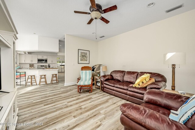 1165 Old Parsonage Dr, Merritt Island, FL 32952 - living area featuring light wood-type flooring and ceiling fan