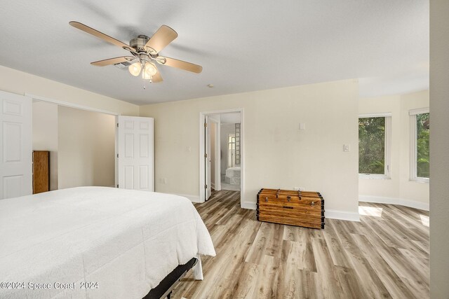 1165 Old Parsonage Dr, Merritt Island, FL 32952 - bedroom featuring baseboards, light wood-style flooring, and ceiling fan