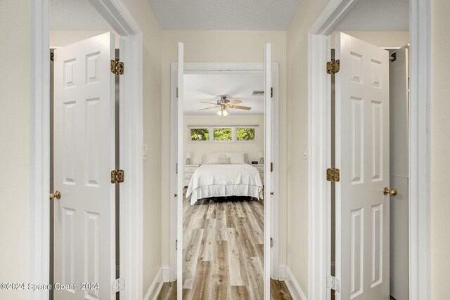 1165 Old Parsonage Dr, Merritt Island, FL 32952 - hall with wood finished floors and baseboards