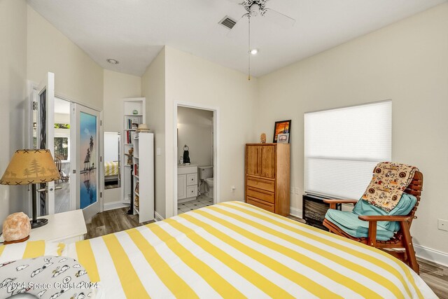 1165 Old Parsonage Dr, Merritt Island, FL 32952 - bedroom with wood finished floors, ensuite bath, baseboards, recessed lighting, and ceiling fan