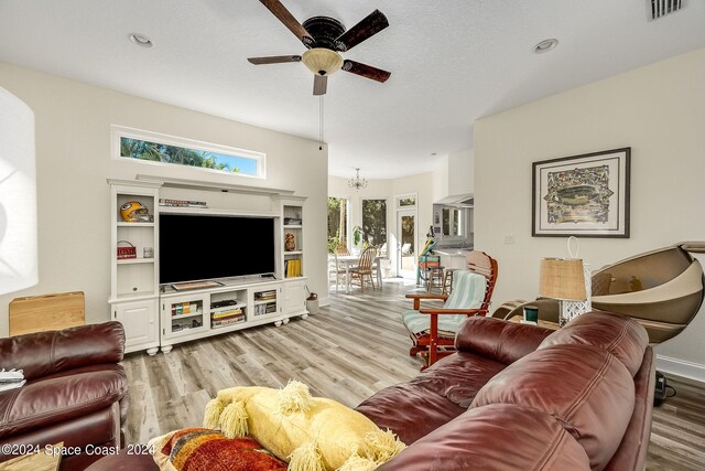 1165 Old Parsonage Dr, Merritt Island, FL 32952 - living room with ceiling fan and light wood-type flooring