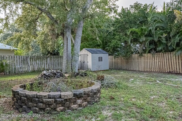 1165 Old Parsonage Dr, Merritt Island, FL 32952 - view of yard featuring a shed and an outdoor structure