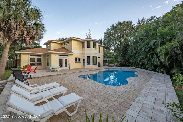 1165 Old Parsonage Dr, Merritt Island, FL 32952 - view of swimming pool featuring french doors, a patio, and fence