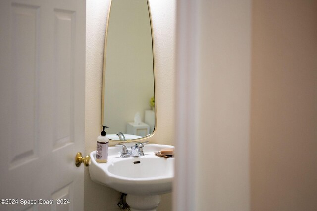 1165 Old Parsonage Dr, Merritt Island, FL 32952 - bathroom featuring a sink