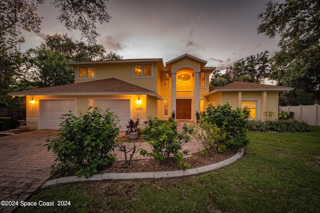 view of front of home with a yard