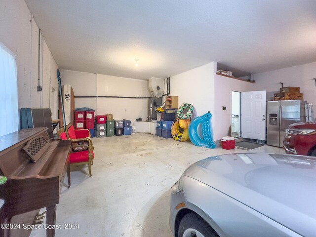 1165 Old Parsonage Dr, Merritt Island, FL 32952 - garage with stainless steel fridge with ice dispenser