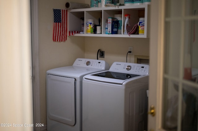 laundry room with washer and dryer