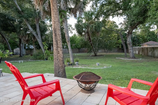 view of patio featuring a fire pit