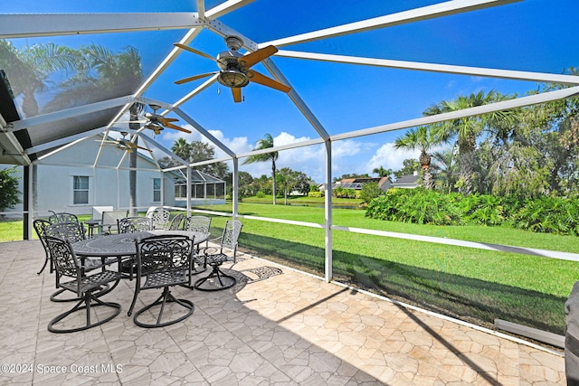 unfurnished sunroom featuring lofted ceiling