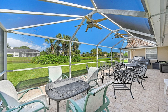 view of patio / terrace featuring glass enclosure