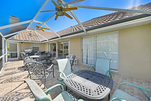 view of patio with a lanai