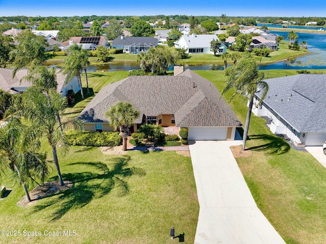 818 Spanish Wells Dr, Melbourne, FL 32940 - aerial view featuring a water view and a residential view