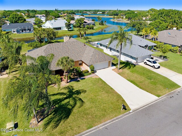 818 Spanish Wells Dr, Melbourne, FL 32940 - birds eye view of property featuring a residential view and a water view