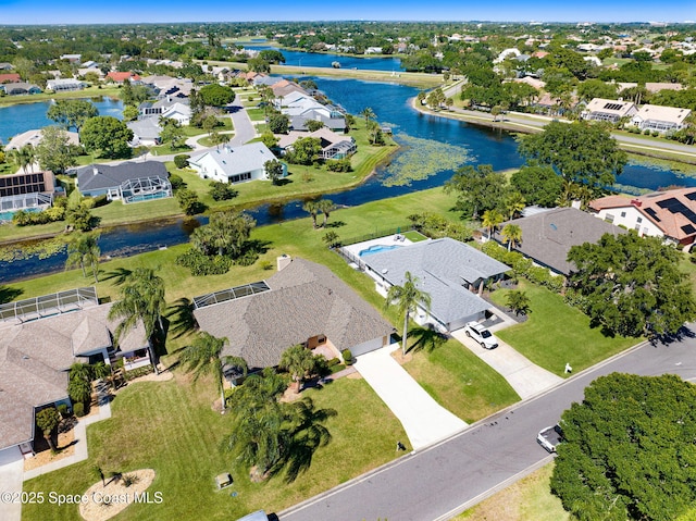 818 Spanish Wells Dr, Melbourne, FL 32940 - drone / aerial view with a water view and a residential view