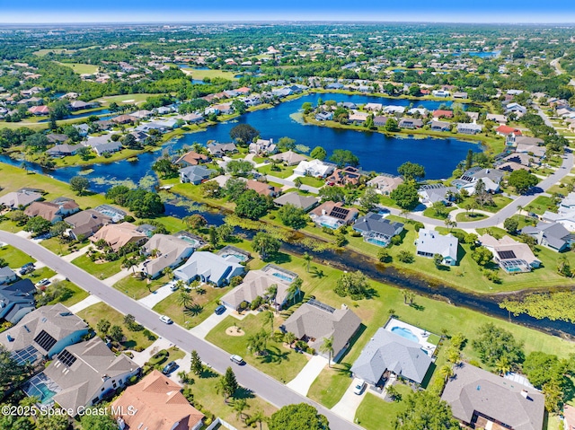 818 Spanish Wells Dr, Melbourne, FL 32940 - bird's eye view featuring a water view and a residential view