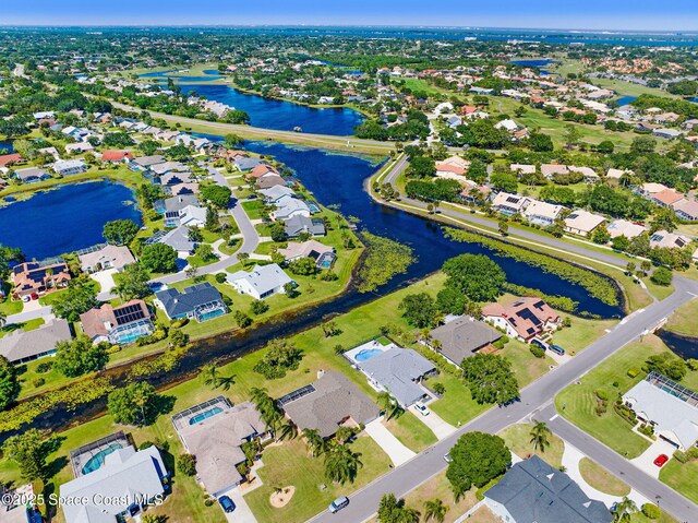 818 Spanish Wells Dr, Melbourne, FL 32940 - birds eye view of property with a water view and a residential view