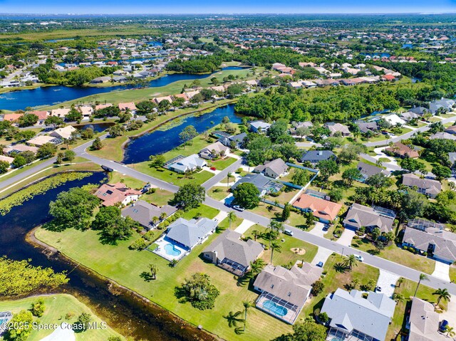 818 Spanish Wells Dr, Melbourne, FL 32940 - bird's eye view featuring a residential view and a water view