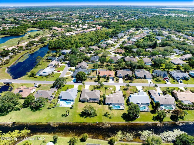 818 Spanish Wells Dr, Melbourne, FL 32940 - birds eye view of property with a residential view and a water view