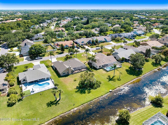 818 Spanish Wells Dr, Melbourne, FL 32940 - bird's eye view with a residential view and a water view