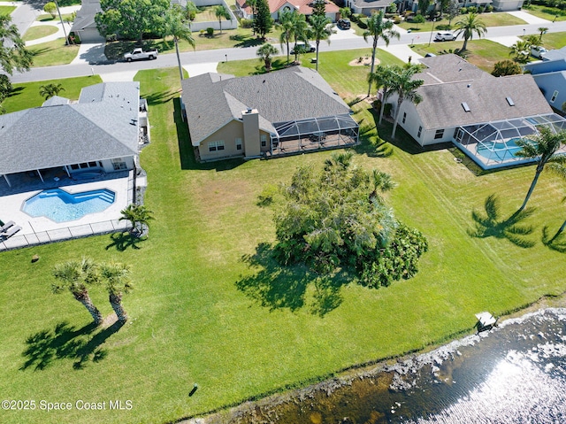 818 Spanish Wells Dr, Melbourne, FL 32940 - drone / aerial view with a residential view and a water view