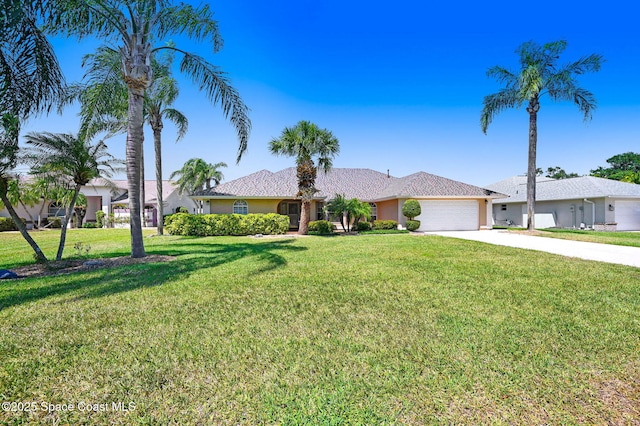818 Spanish Wells Dr, Melbourne, FL 32940 - single story home featuring a garage, stucco siding, a front lawn, and concrete driveway