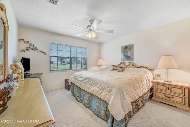 818 Spanish Wells Dr, Melbourne, FL 32940 - bedroom featuring light carpet, visible vents, and ceiling fan