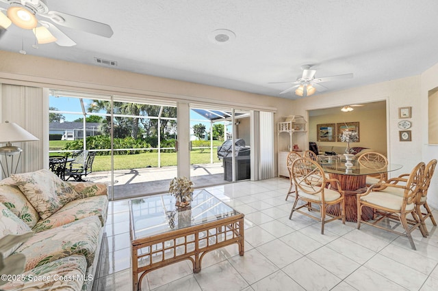 818 Spanish Wells Dr, Melbourne, FL 32940 - dining space with visible vents, ceiling fan, and a healthy amount of sunlight